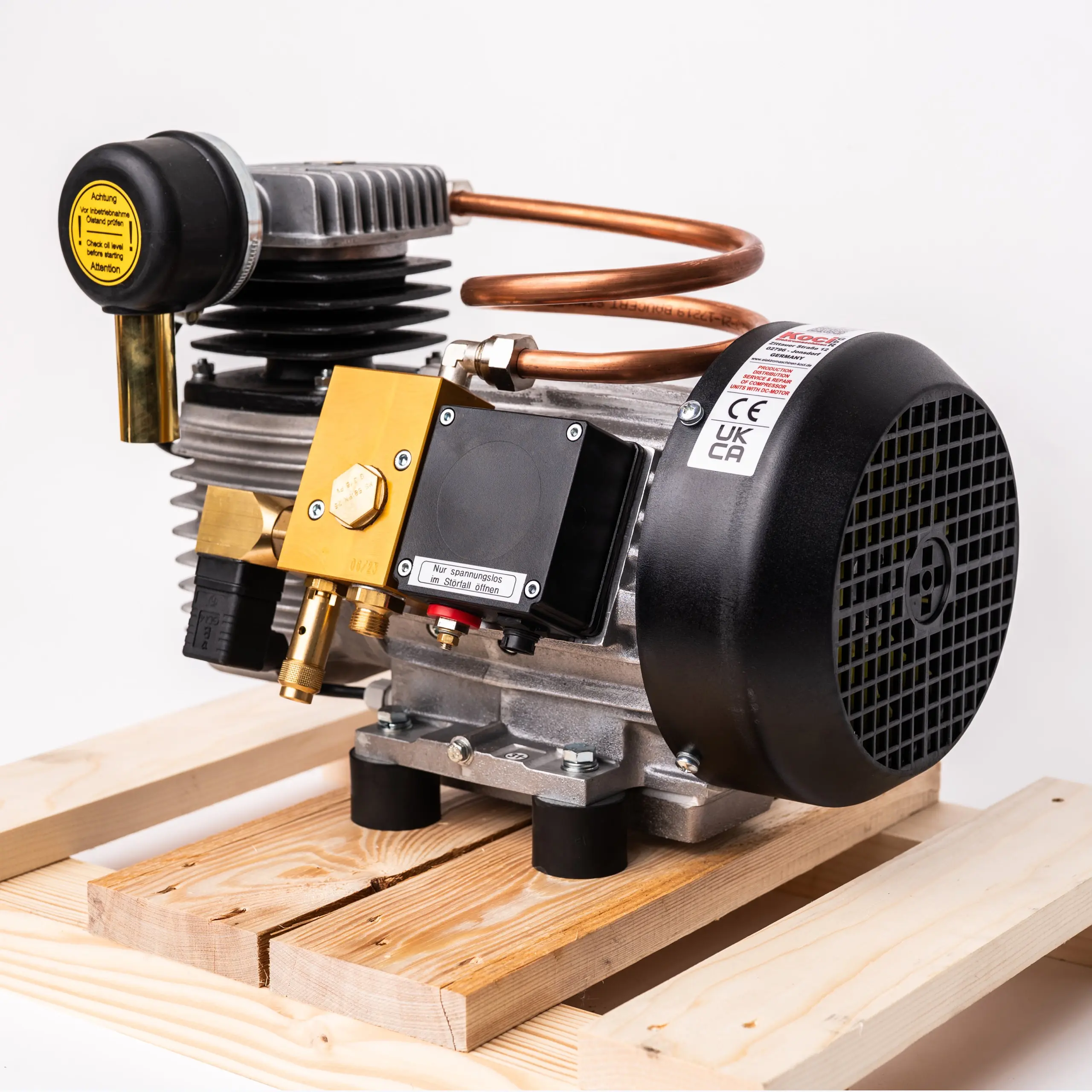 Rear view of a KOCI KC100 DC compressor