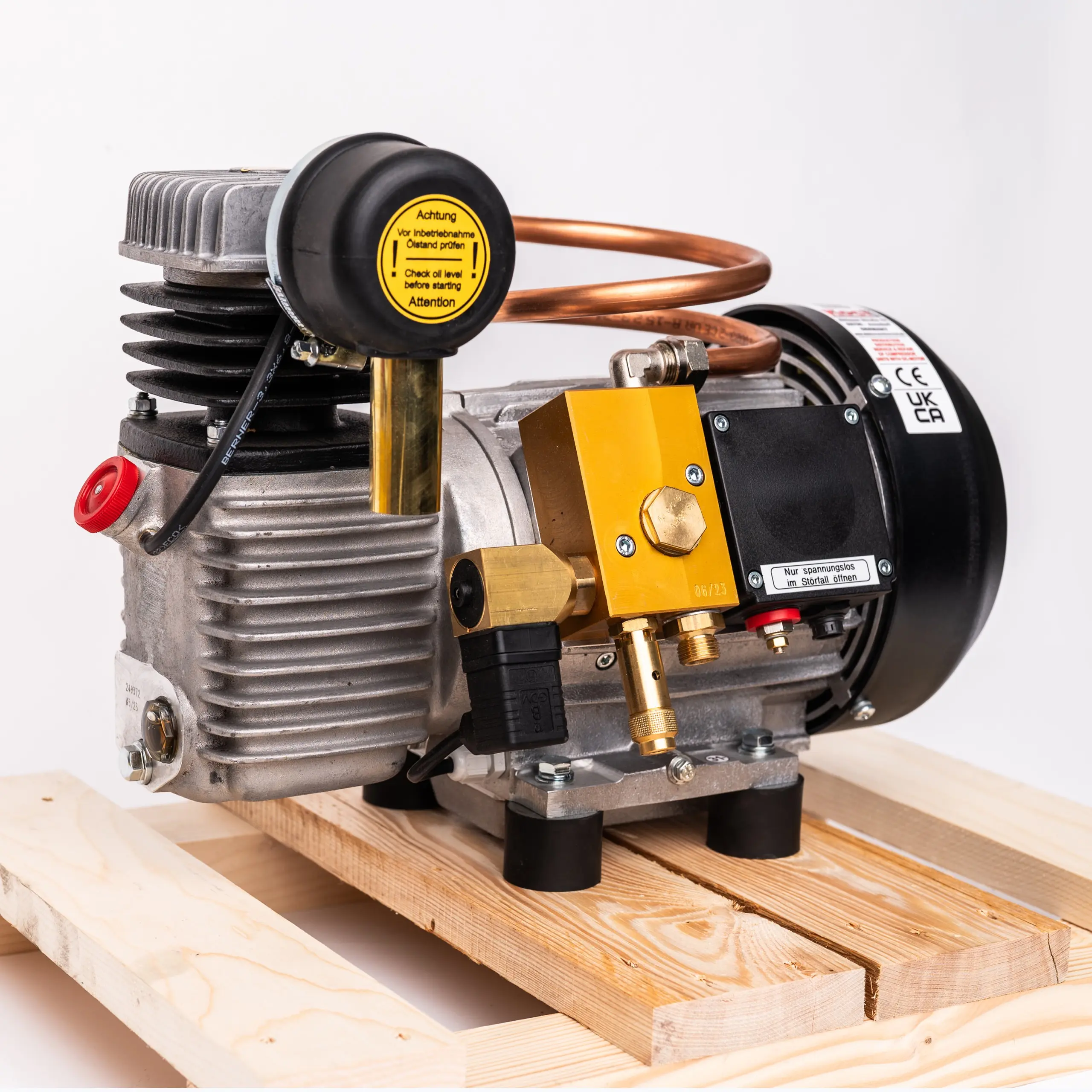 Side view of a KOCI KC100 DC compressor